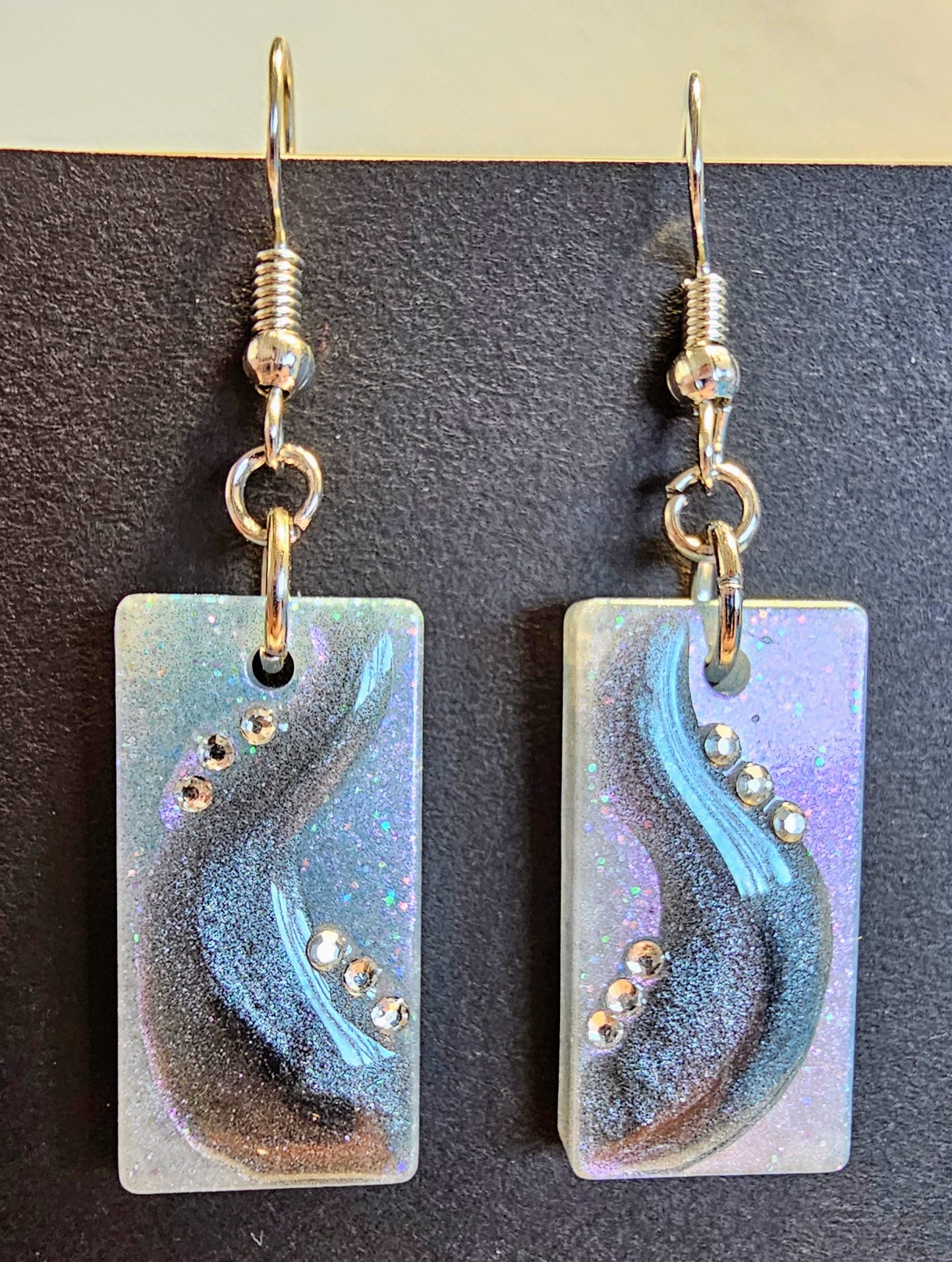 Earrings with an abstract and rhinestone design