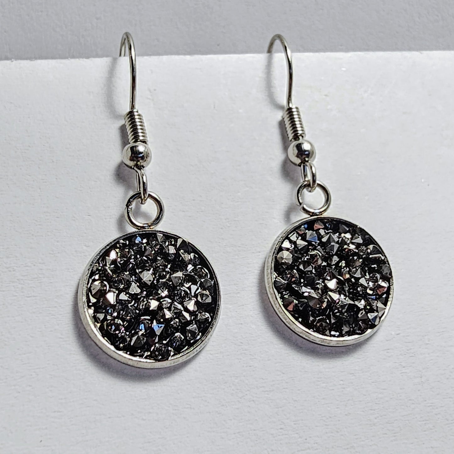 Gunmetal mini gems in disc bezel